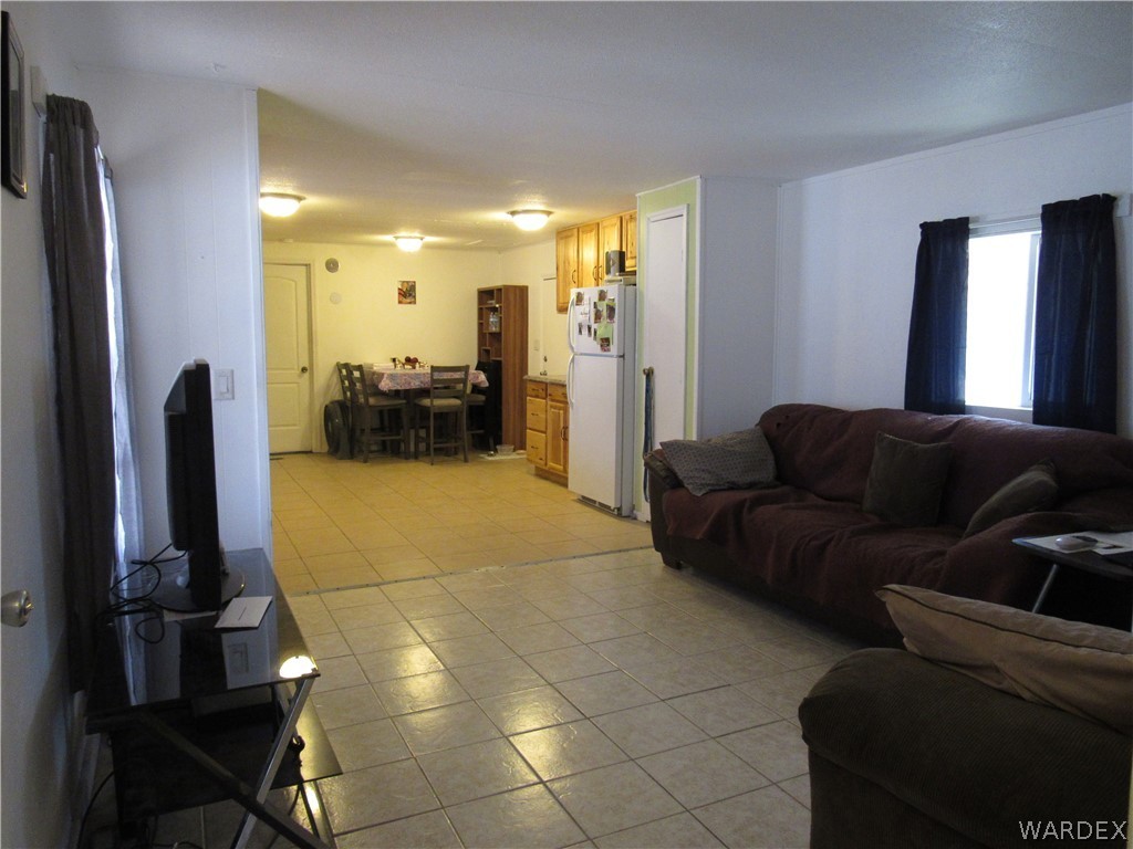 1846 Rio Grande Road Bullhead City, AZ 86442 - Photo 8 of 18 a living room with furniture and a fireplace