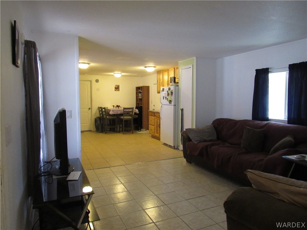 1846 Rio Grande Road Bullhead City, AZ 86442 - Photo 9 of 18 a living room with furniture and a large window