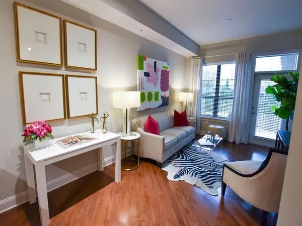 a living room with furniture and a table