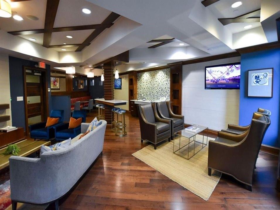 92 West Paces Ferry Road Northwest, Unit 8007 Atlanta, GA 30305 - Photo 43 of 49 a living room with furniture and a flat screen tv