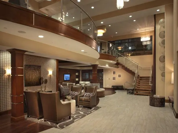 a room with gym equipment and a large window