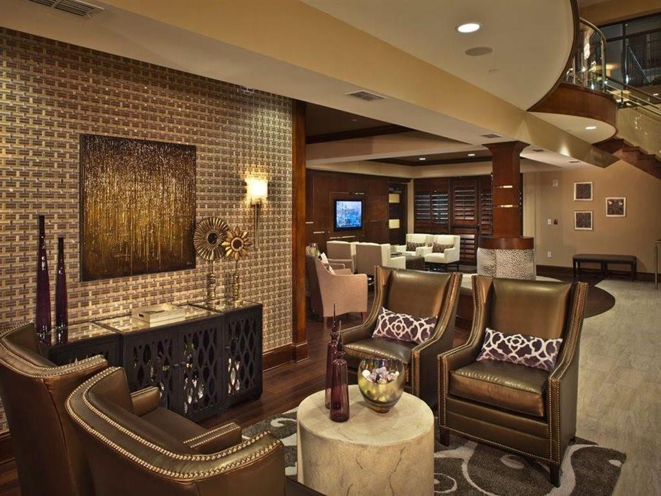 92 West Paces Ferry Road Northwest, Unit 8007 Atlanta, GA 30305 - Photo 48 of 49 a living room with furniture and a fireplace