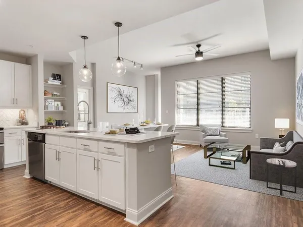 a large kitchen with a large window