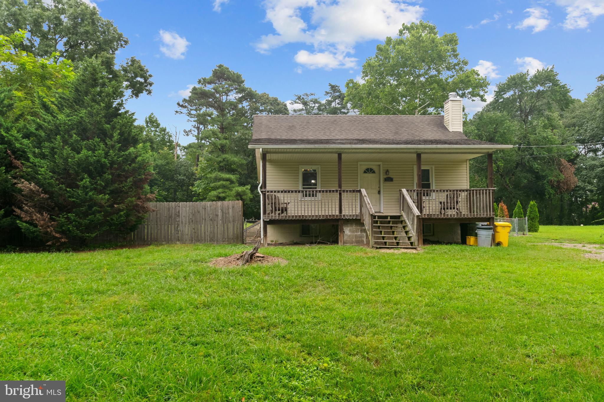 7721 Locust Wood Road Severn, MD 21144 - Photo 1 of 29 a view of a house with a backyard
