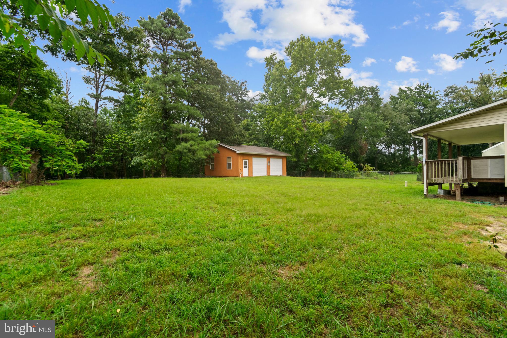 7721 Locust Wood Road Severn, MD 21144 - Photo 8 of 29 a view of a house with a yard