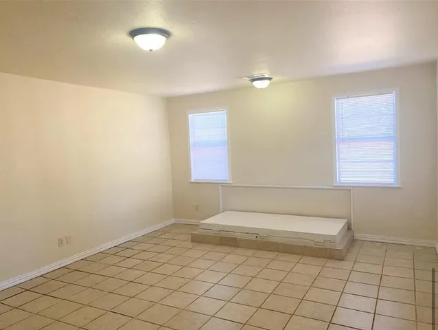 a bathroom with a sink a vanity and a mirror