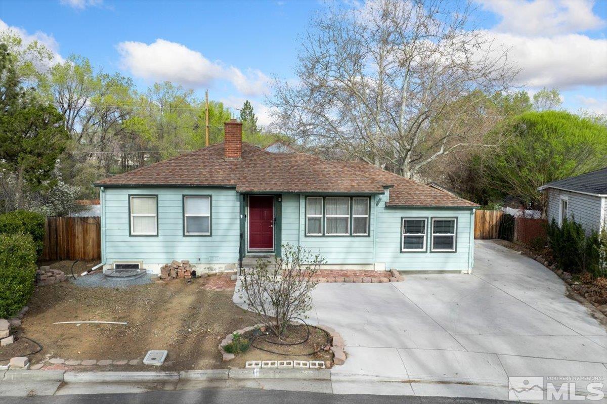 240 Bisby Street Reno, NV 89512 - Photo 24 of 27 a front view of a house with yard