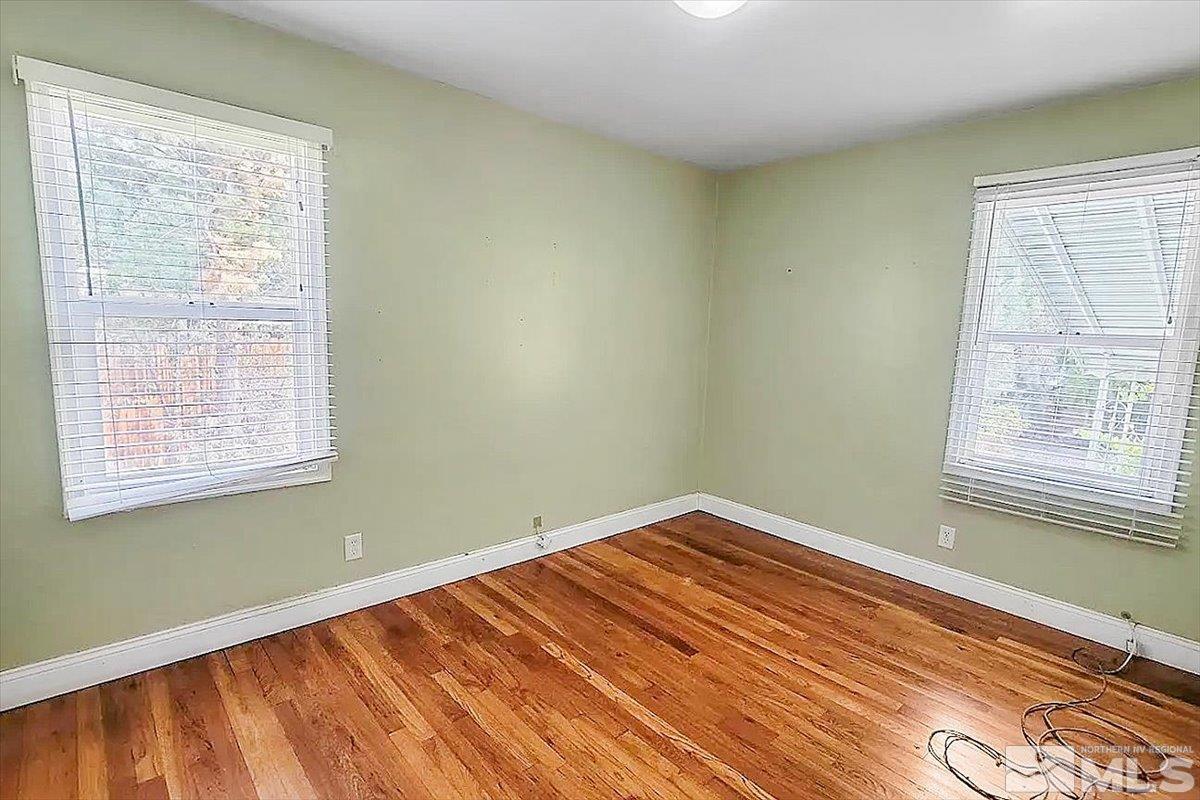 240 Bisby Street Reno, NV 89512 - Photo 8 of 27 a view of a room with wooden floor and fan