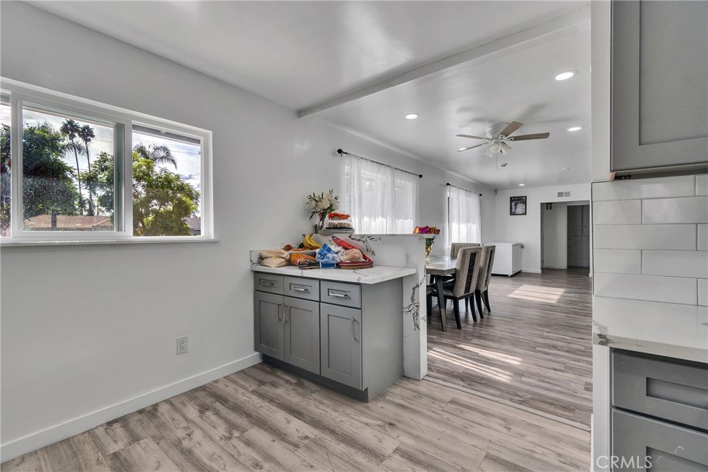 5121 Sierra Street Riverside, CA 92504 - Photo 20 of 34 a kitchen with stainless steel appliances granite countertop a stove and a refrigerator