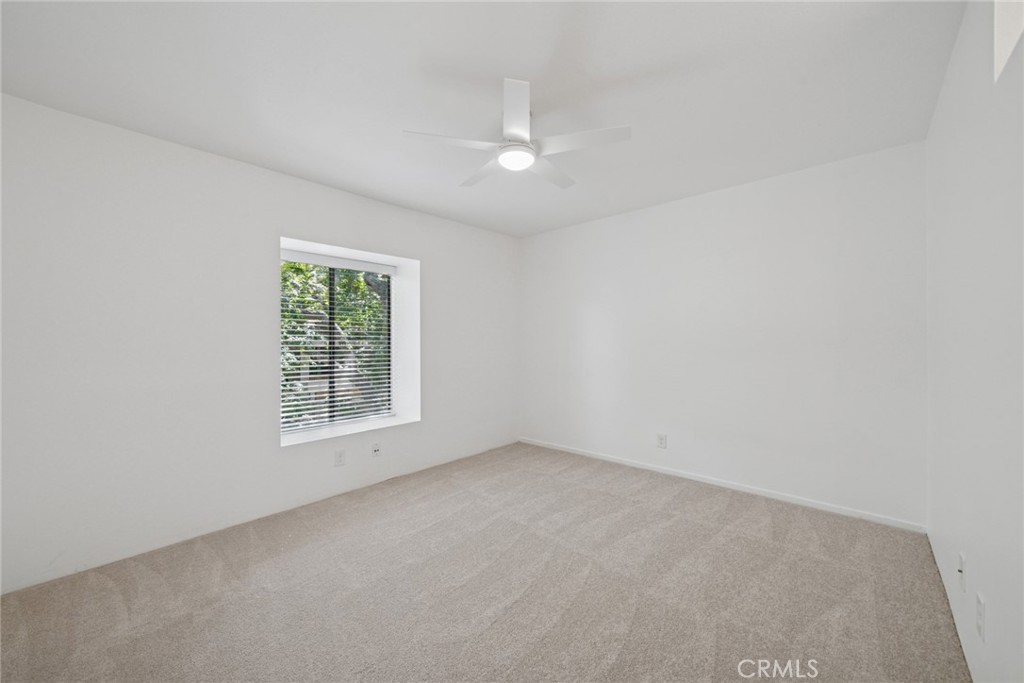 82 Streamwood Irvine, CA 92620 - Photo 13 of 26 an empty room with a window