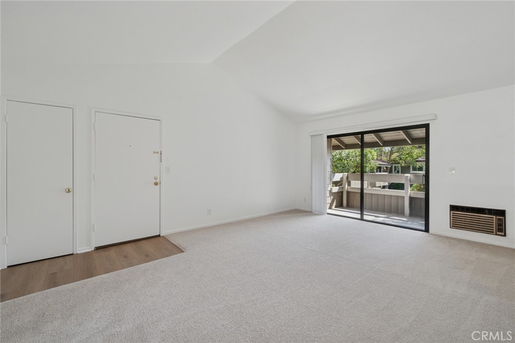 82 Streamwood Irvine, CA 92620 - Photo 10 of 26 a view of an empty room with a window