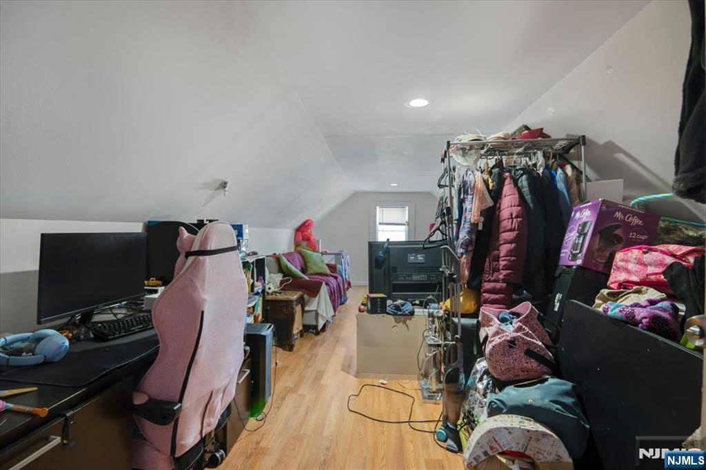 22 Tuttle Street Wallington, NJ 07057 - Photo 30 of 33 a bed room with a bed and a desk