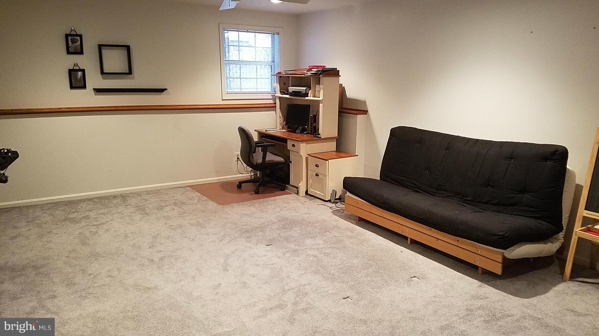637 Nollmeyer Road Baltimore, MD 21220 - Photo 26 of 28 Large Finished Basement Has Tons of Storage Space