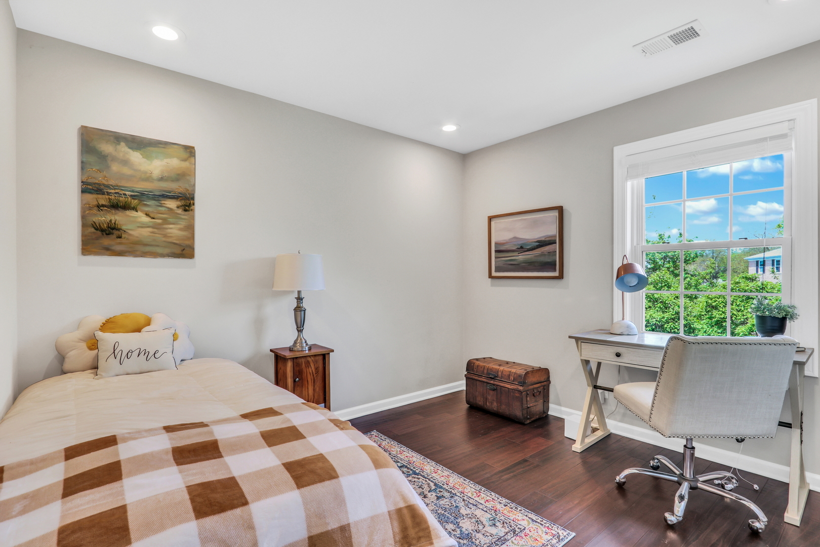 104 East Winchester Road, Unit E Libertyville, IL 60048 - Photo 13 of 23 a bedroom with a bed and a chair