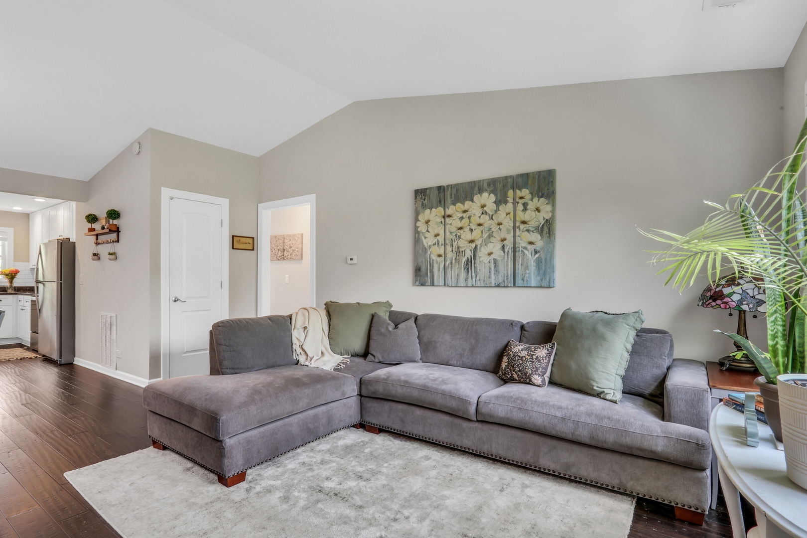 104 East Winchester Road, Unit E Libertyville, IL 60048 - Photo 2 of 23 a living room with furniture and a couch