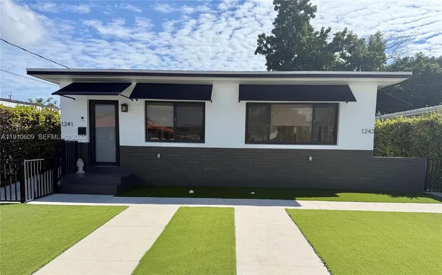 a view of outdoor space pool patio and outdoor seating