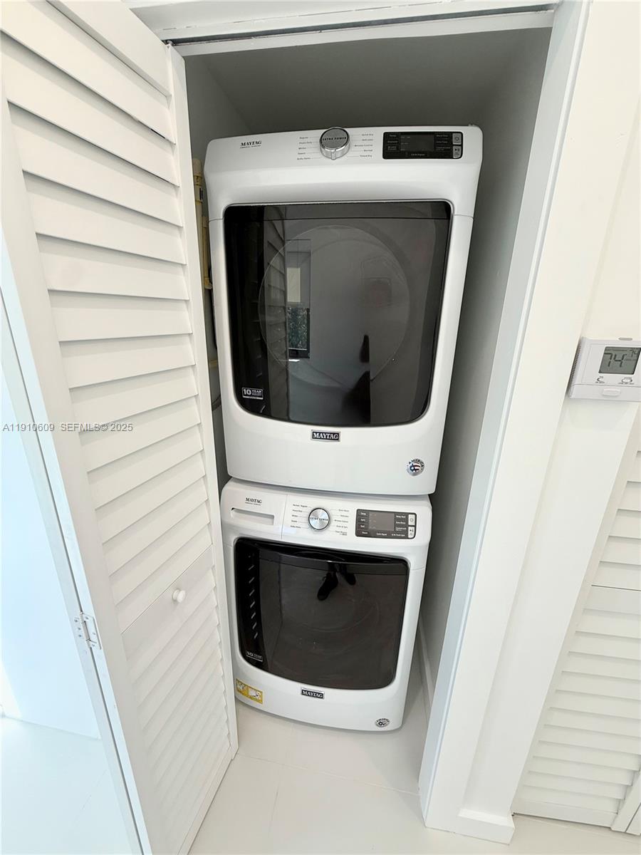 1241 Southwest 30th Place, Unit 1241 Miami, FL 33135 - Photo 5 of 10 a utility room with dryer and washer