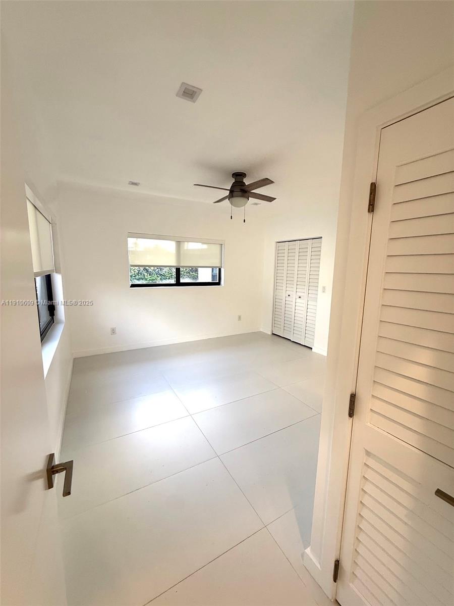 1241 Southwest 30th Place, Unit 1241 Miami, FL 33135 - Photo 6 of 10 a view of a livingroom with a window