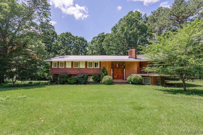 3925 Woodsdale Drive Alberta, VA 23821 - Photo 3 of 50 a front view of a house with garden