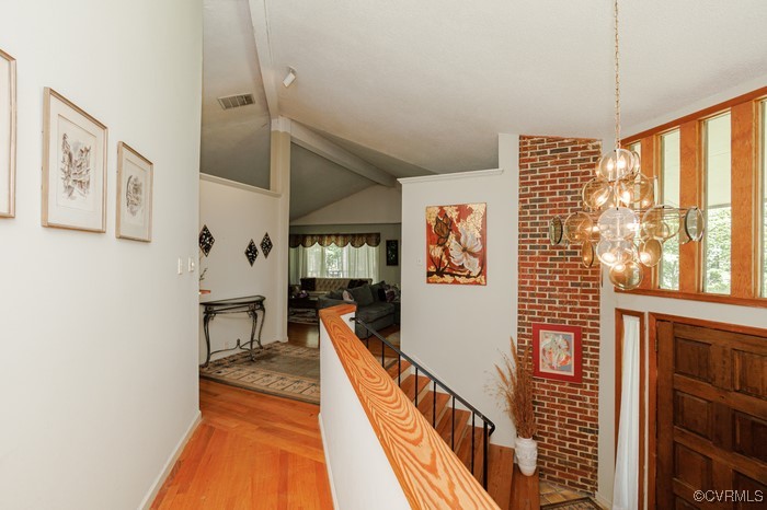 3925 Woodsdale Drive Alberta, VA 23821 - Photo 10 of 50 a view of a hallway with wooden floor and staircase