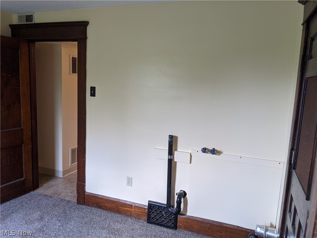 41 South Main Street Rittman, OH 44270 - Photo 11 of 22 laundry or bedroom in upstairs apartment