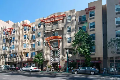 a front view of a building with street view