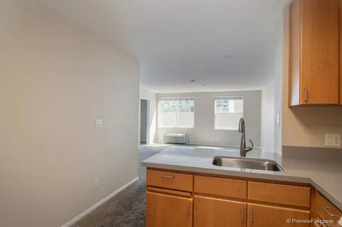 a bathroom with a sink and a window