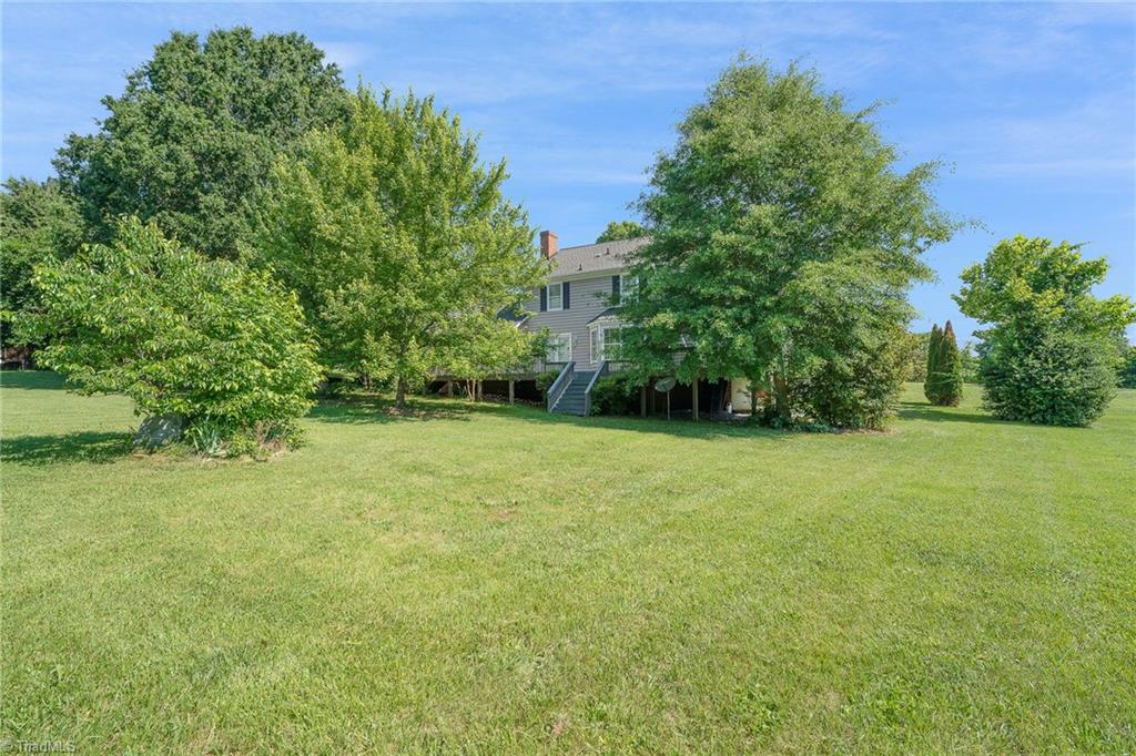 4803 Fox Chase Road Greensboro, NC 27410 - Photo 12 of 37 Imagine having your morning cup of coffee with this serene view!