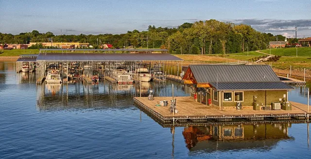 a terrace with outdoor seating and city view
