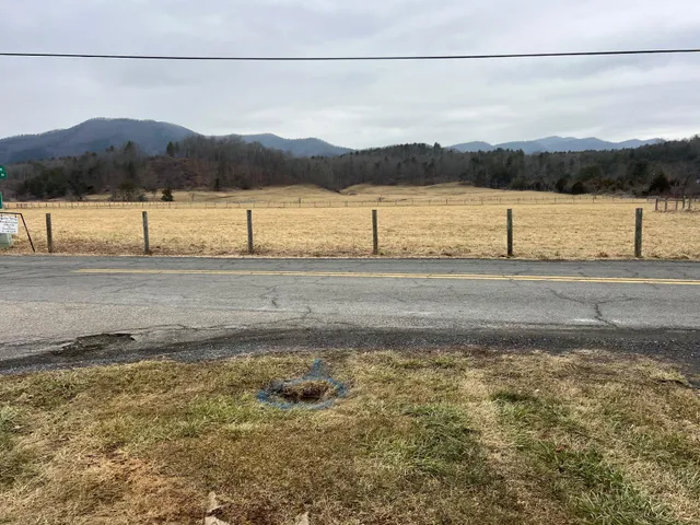 a view of mountain with lake view