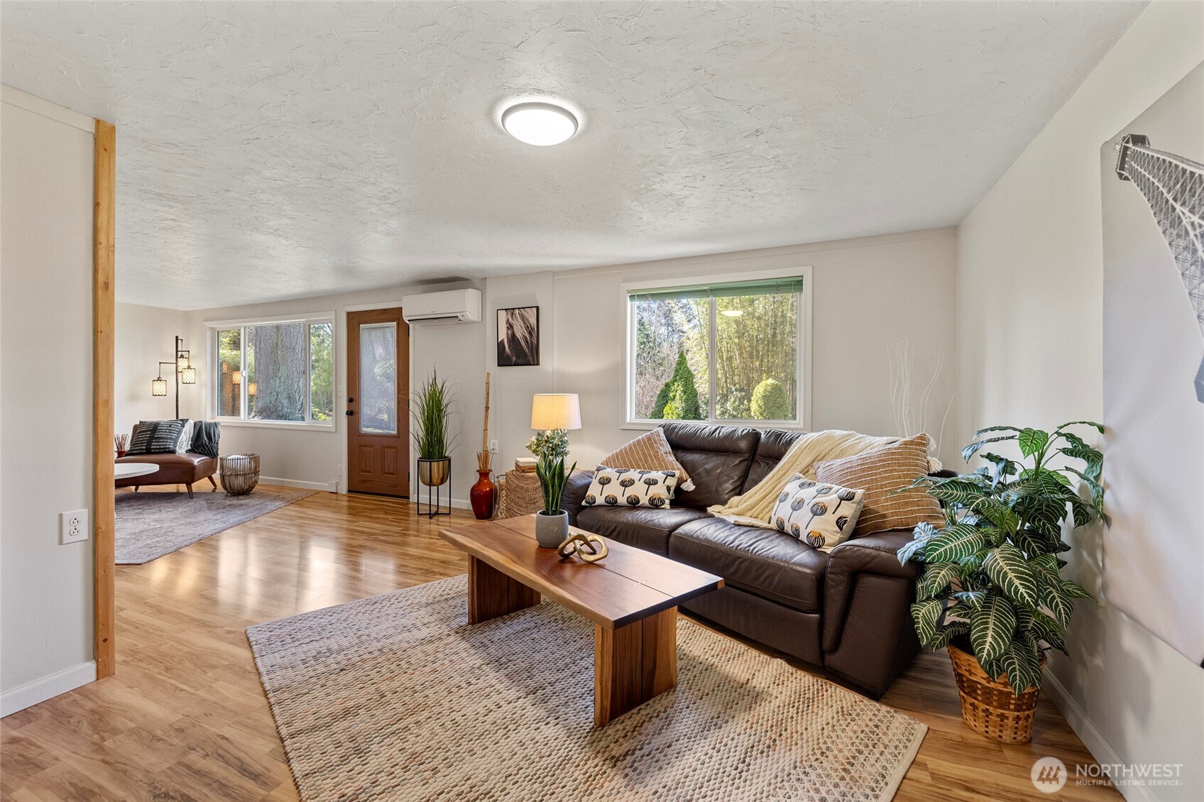 2408 148th Street Southwest Lynnwood, WA 98087 - Photo 14 of 40 a living room with furniture and a potted plant