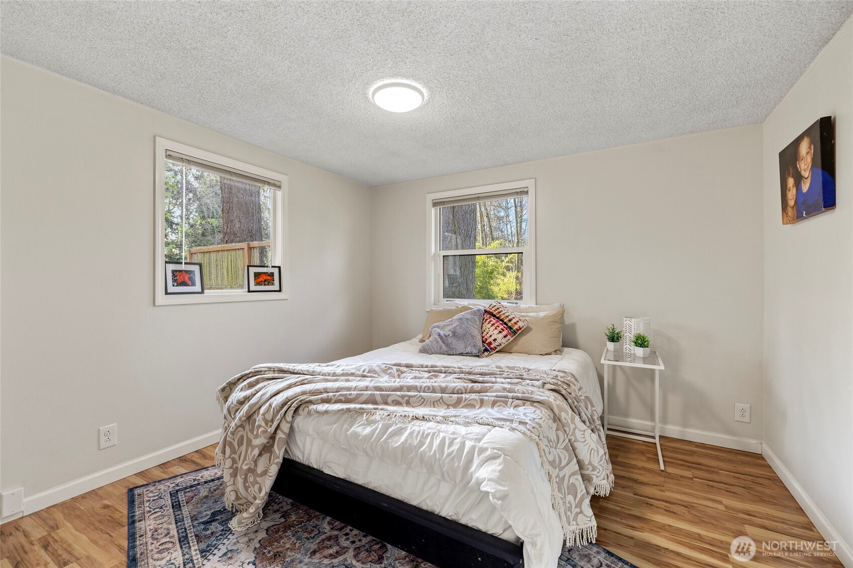2408 148th Street Southwest Lynnwood, WA 98087 - Photo 19 of 40 a bedroom with bed and a window