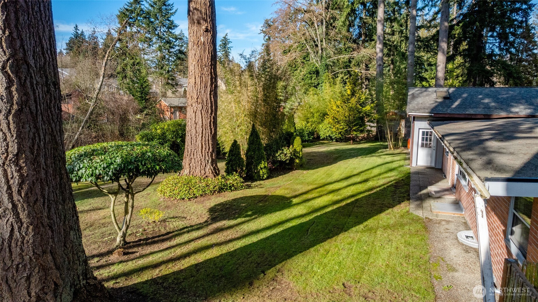 2408 148th Street Southwest Lynnwood, WA 98087 - Photo 26 of 40 a view of a backyard with sitting area