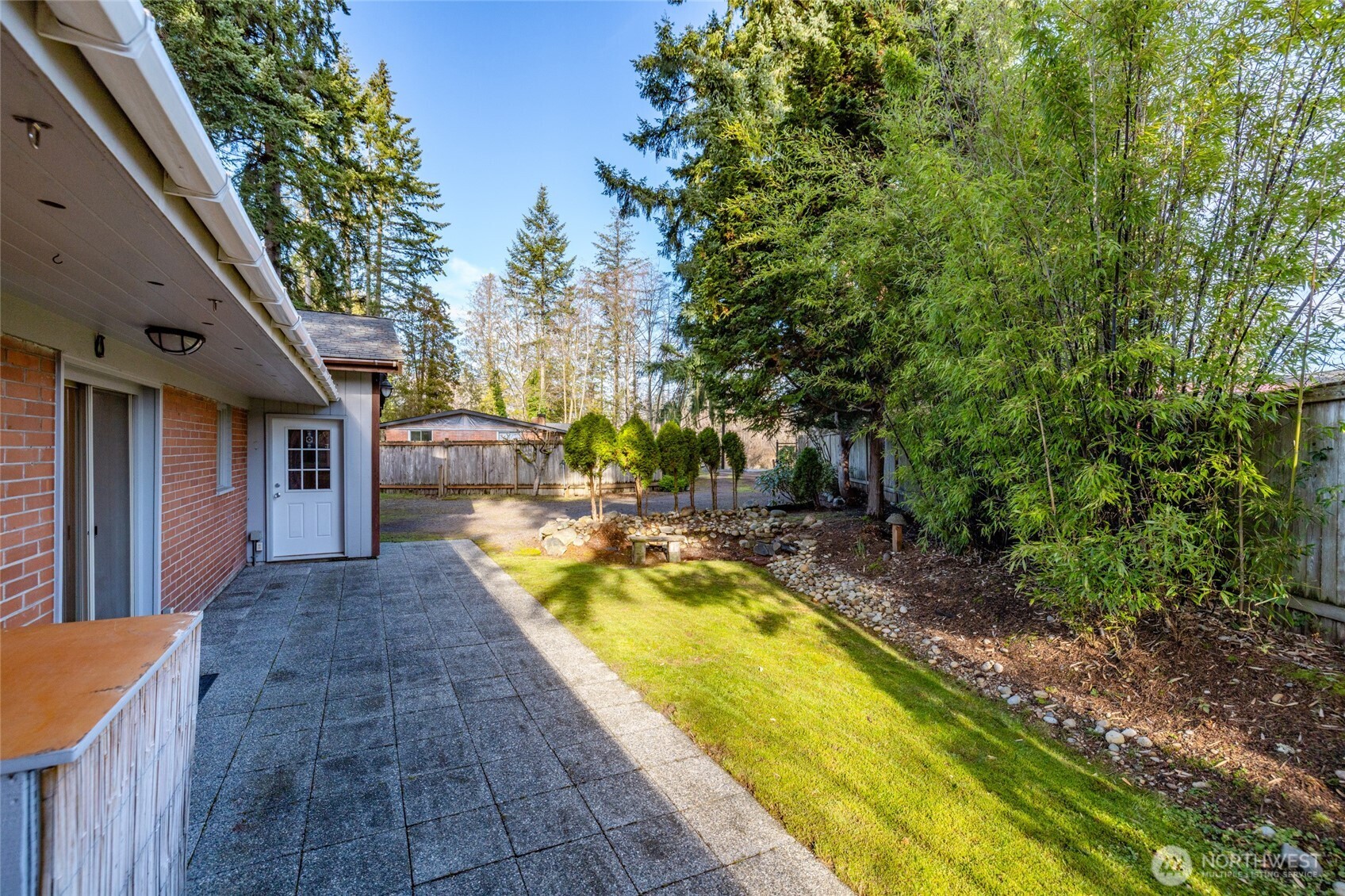 2408 148th Street Southwest Lynnwood, WA 98087 - Photo 31 of 40 a view of a backyard with swimming pool