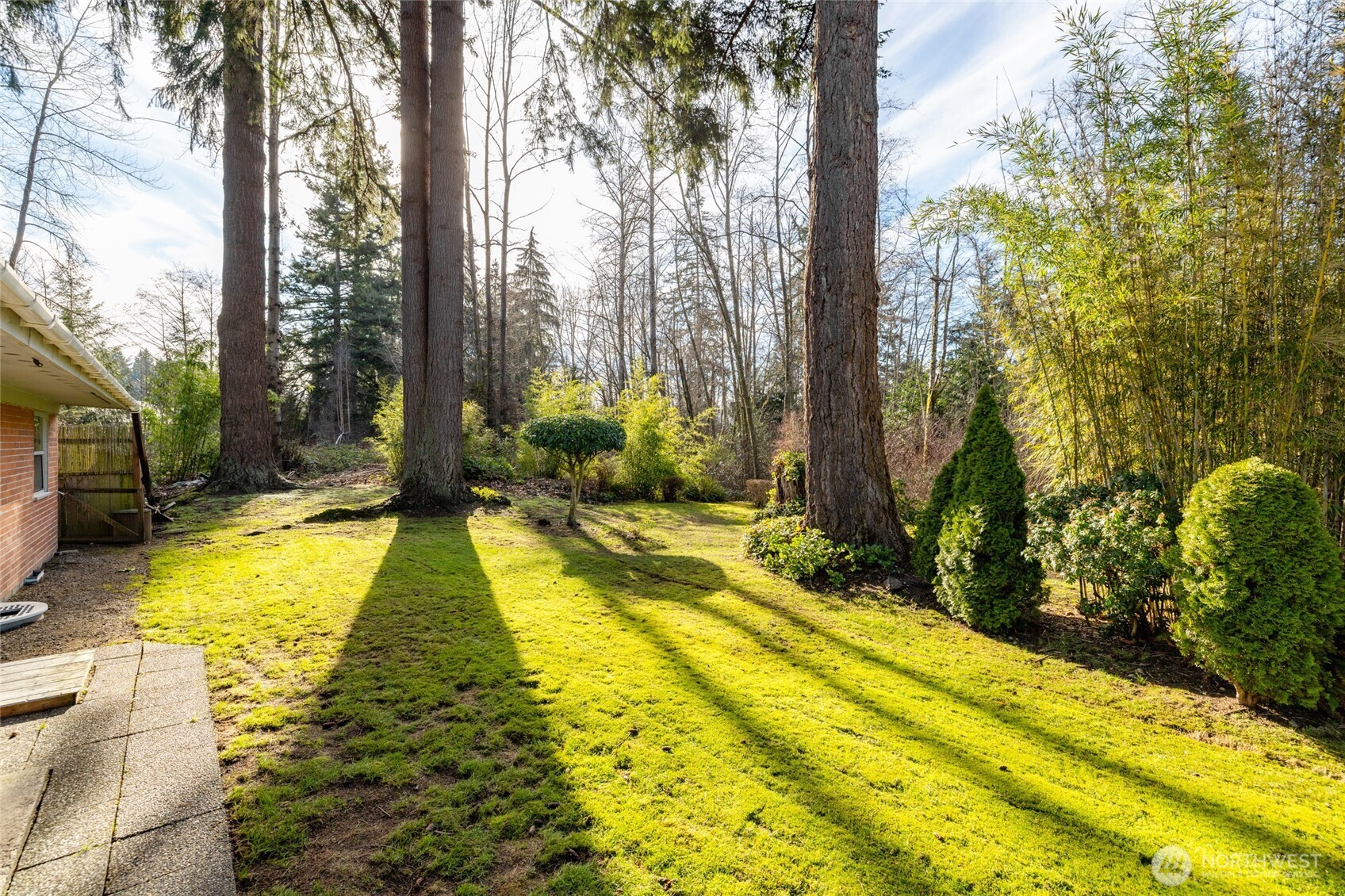 2408 148th Street Southwest Lynnwood, WA 98087 - Photo 35 of 40 a swimming pool with outdoor seating and yard