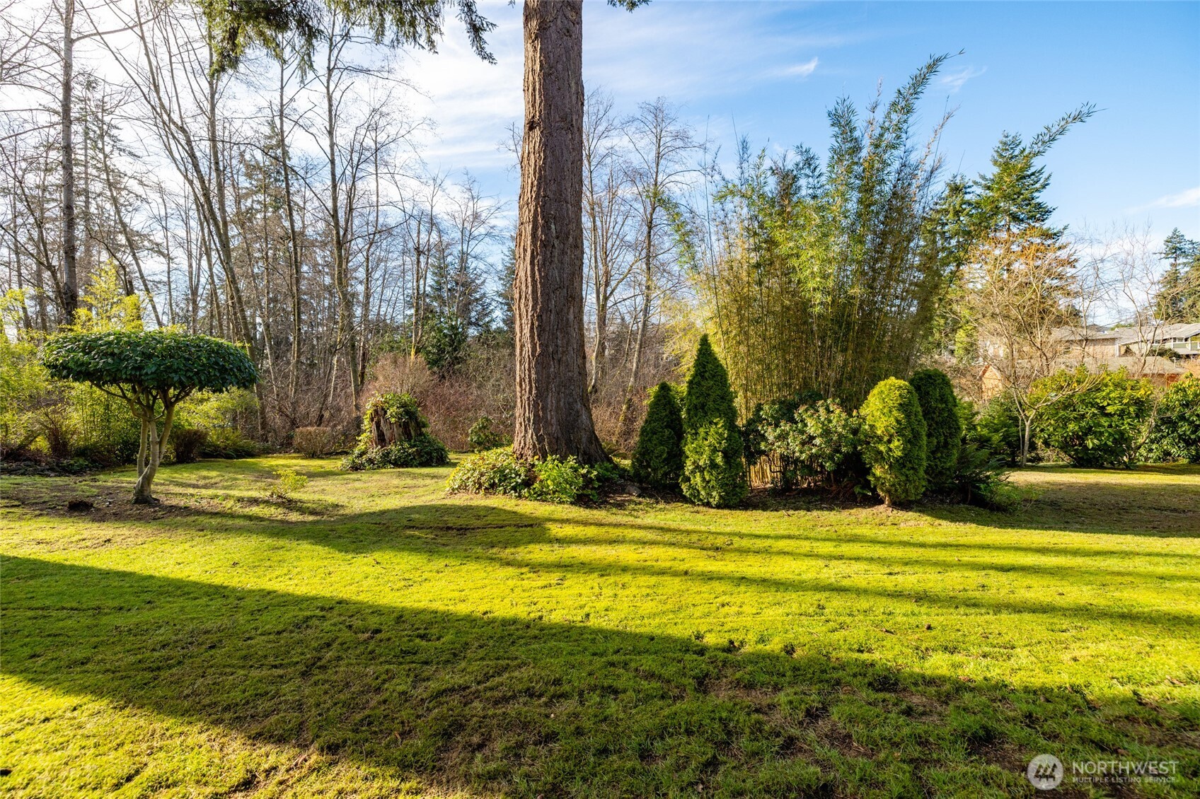 2408 148th Street Southwest Lynnwood, WA 98087 - Photo 36 of 40 a view of a swimming pool with an outdoor space and seating area