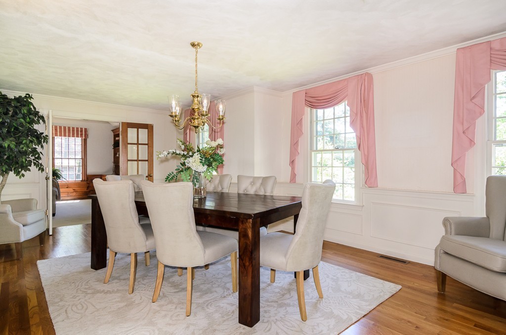 7 Folsoms Pond Road Wayland, MA 01778 - Photo 11 of 18 a dining room with furniture a chandelier and wooden floor