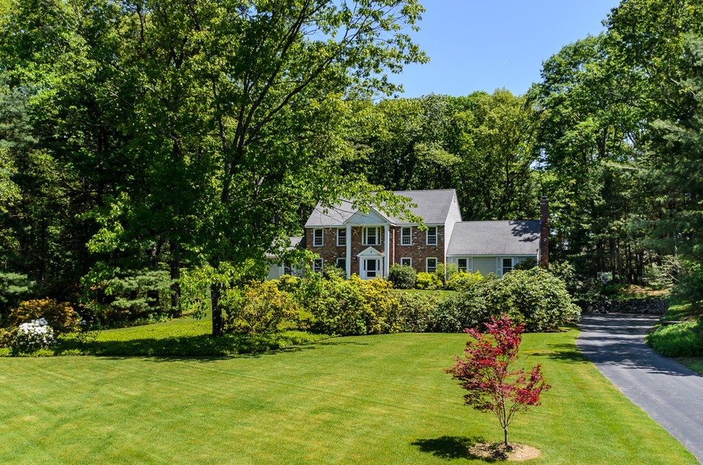 7 Folsoms Pond Road Wayland, MA 01778 - Photo 18 of 18 a view of a garden with a house