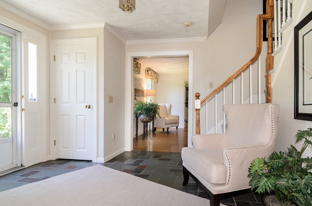 7 Folsoms Pond Road Wayland, MA 01778 - Photo 2 of 18 a living room with furniture and a table