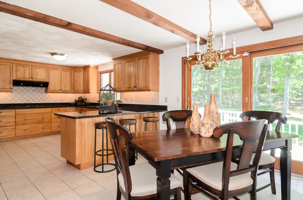 7 Folsoms Pond Road Wayland, MA 01778 - Photo 8 of 18 a view of a dining room with furniture window and outside view
