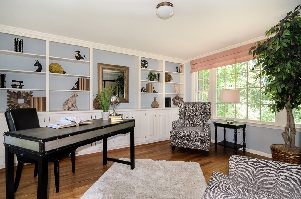 7 Folsoms Pond Road Wayland, MA 01778 - Photo 10 of 18 a living room with furniture and a large window
