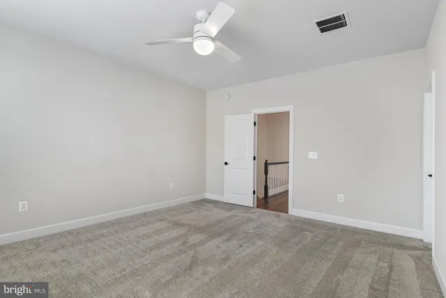 a picture of a bathroom with a window