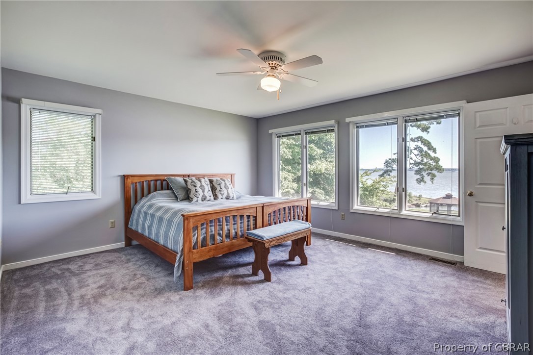 546 Eubank Landing Road Topping, VA 23169 - Photo 25 of 40 Master bedroom overlooking the water.