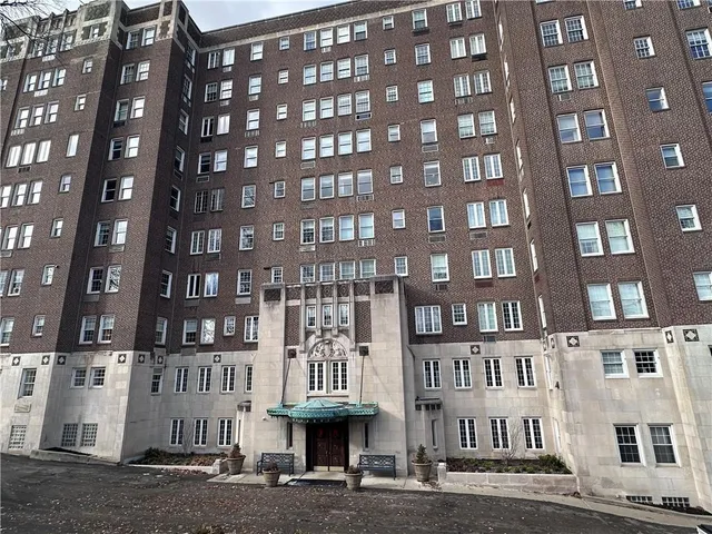 a view of a building with a street