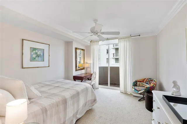 a bathroom with a toilet a sink and a mirror