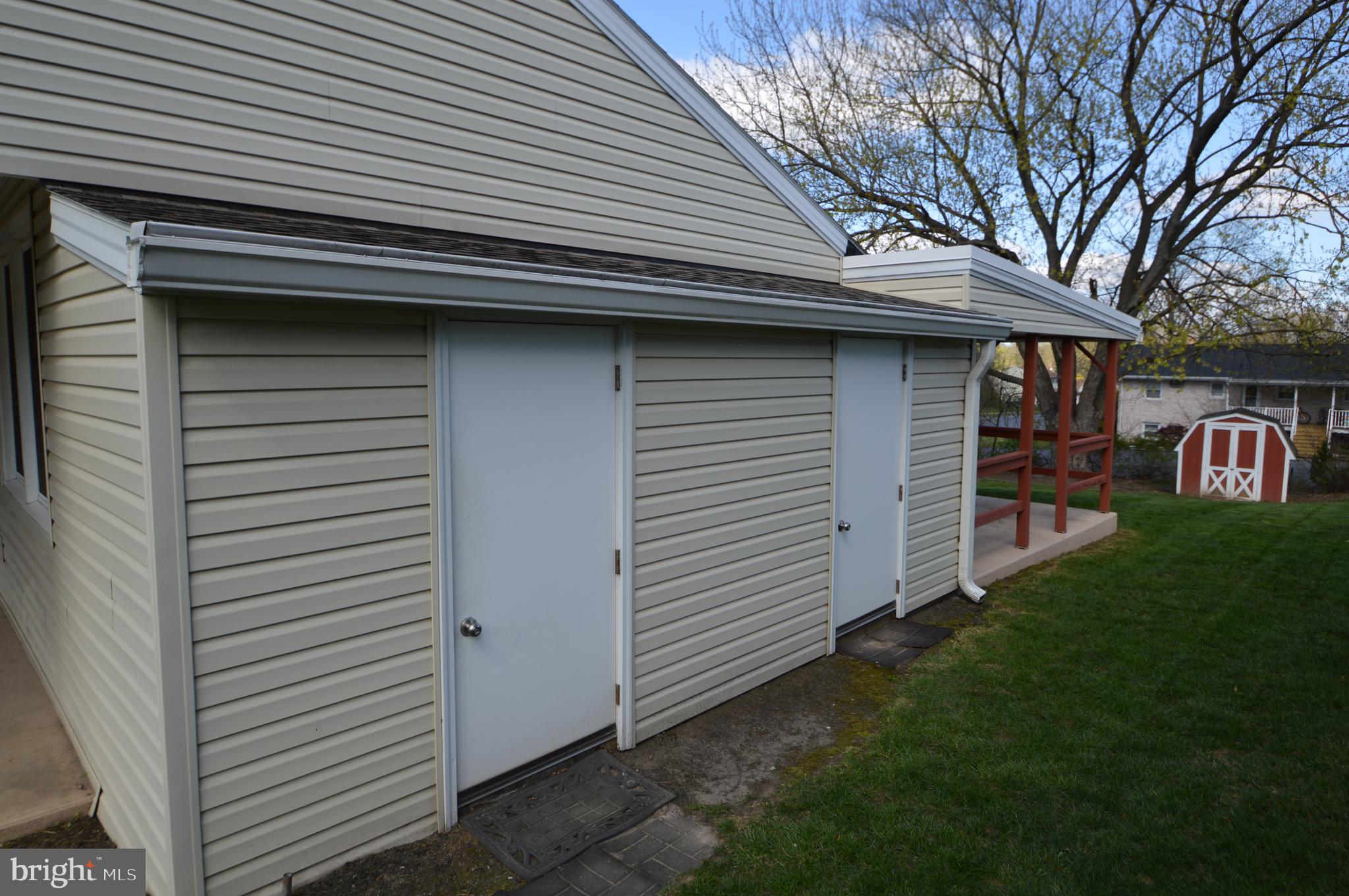401 Lemon Street Elizabethtown, PA 17022 - Photo 11 of 39 a front view of a house with garage