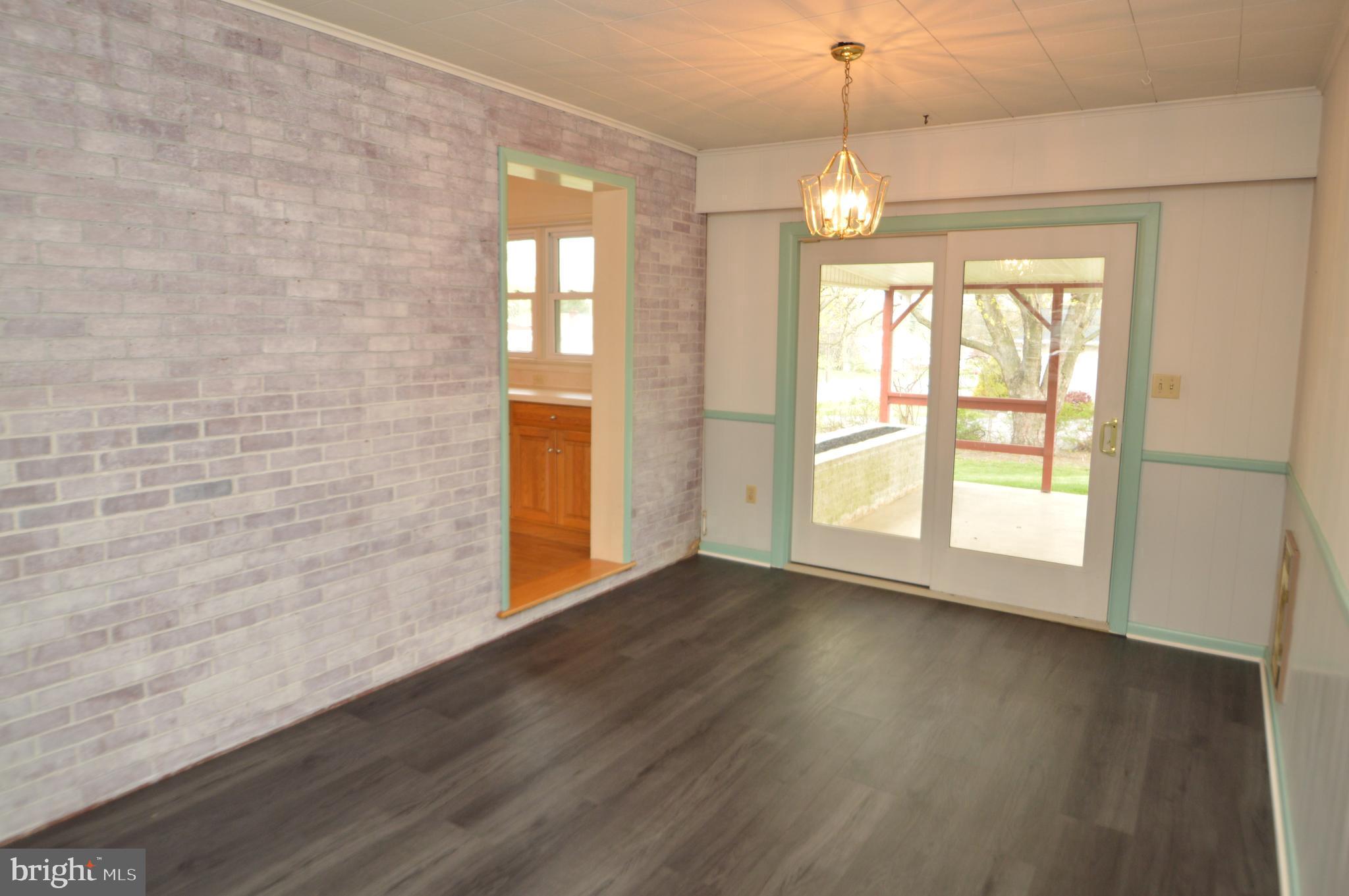 401 Lemon Street Elizabethtown, PA 17022 - Photo 18 of 39 a view of an empty room with wooden floor and a window