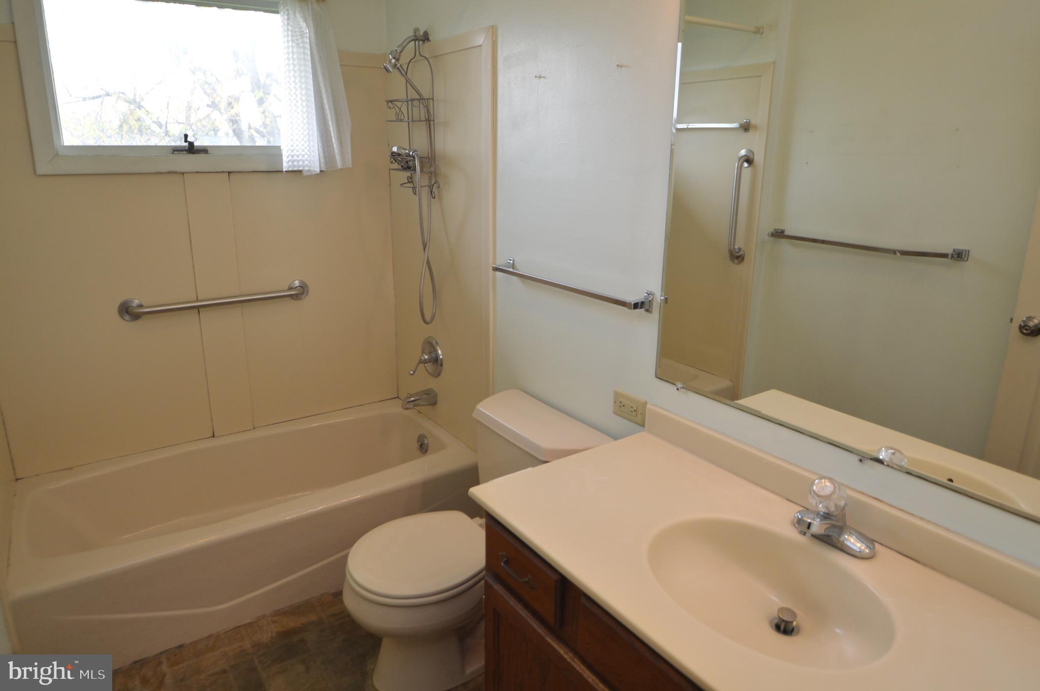 401 Lemon Street Elizabethtown, PA 17022 - Photo 24 of 39 a bathroom with a sink toilet and shower