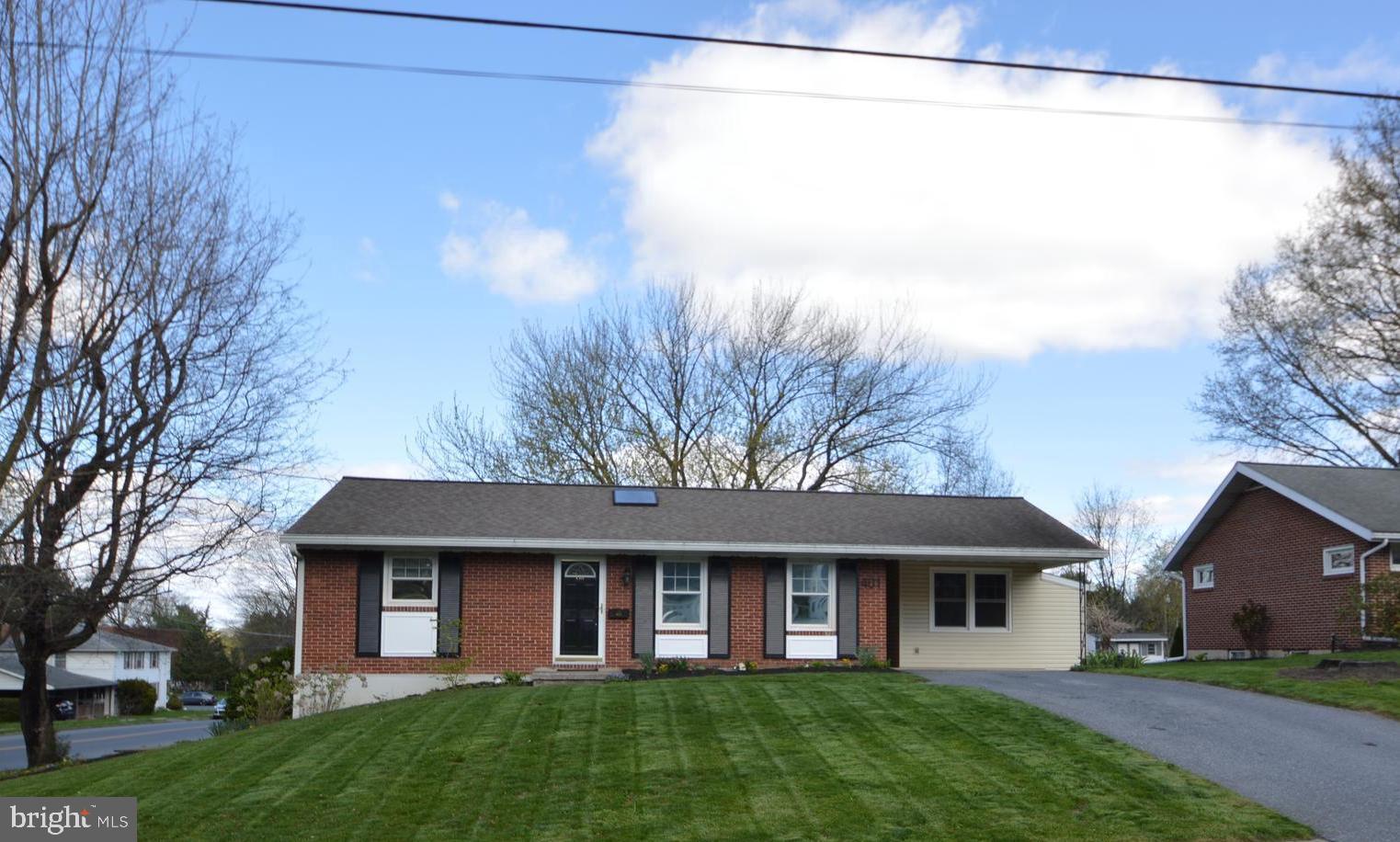 401 Lemon Street Elizabethtown, PA 17022 - Photo 35 of 39 a front view of a house with a yard and trees