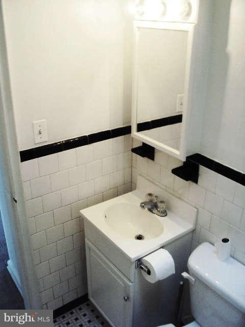 7832 Wynbrook Road Baltimore, MD 21224 - Photo 8 of 14 Bathroom Vanity